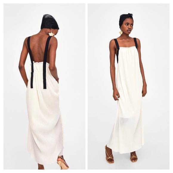 white dress with black straps